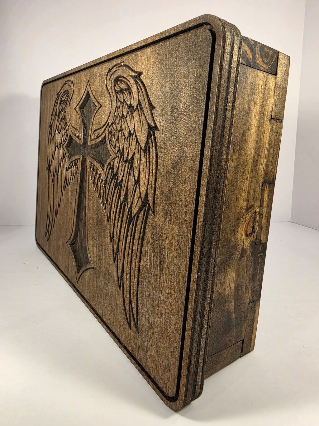 Cross design with wings shown in Dark Walnut