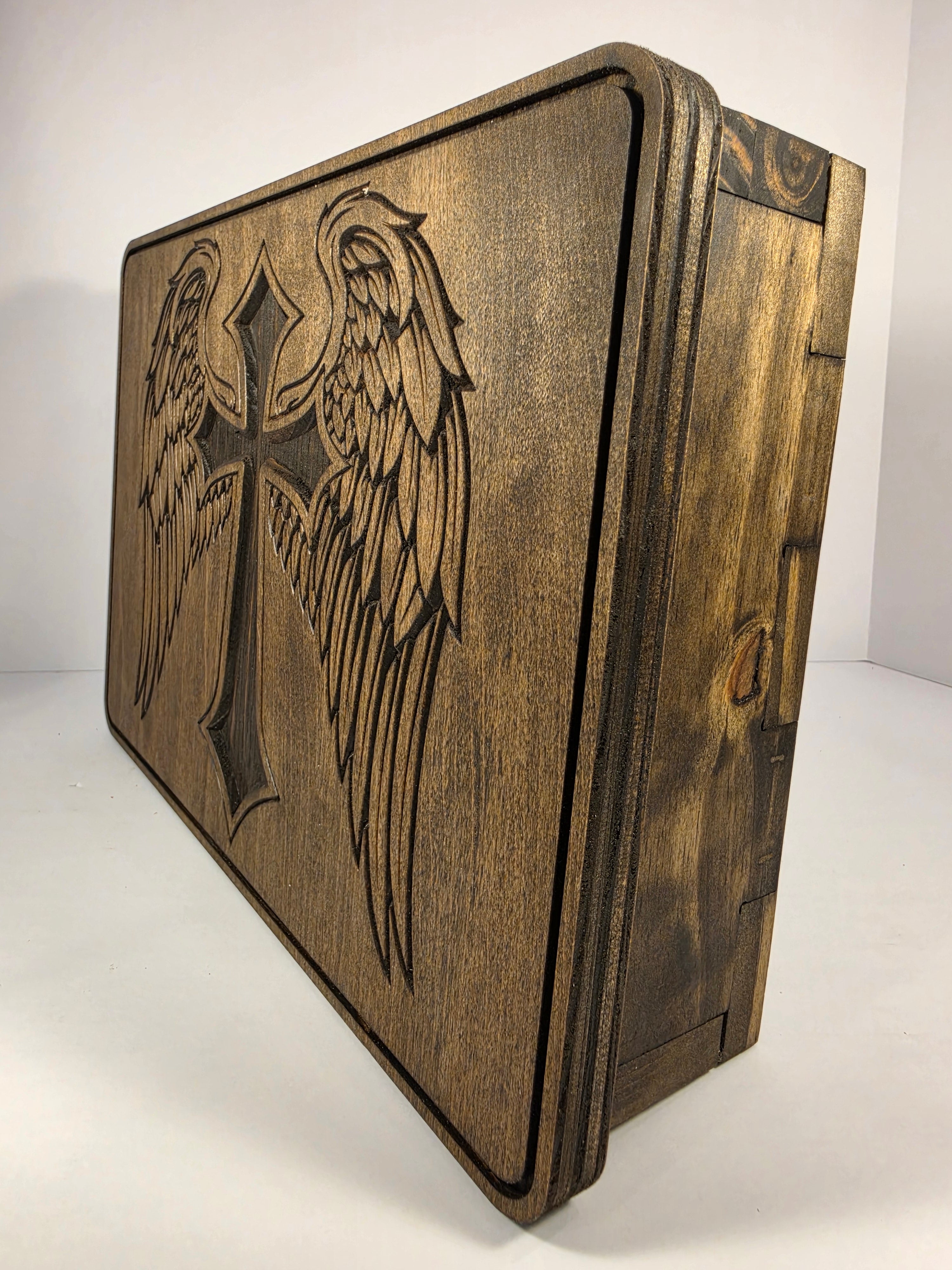 Cross design with wings shown in Dark Walnut