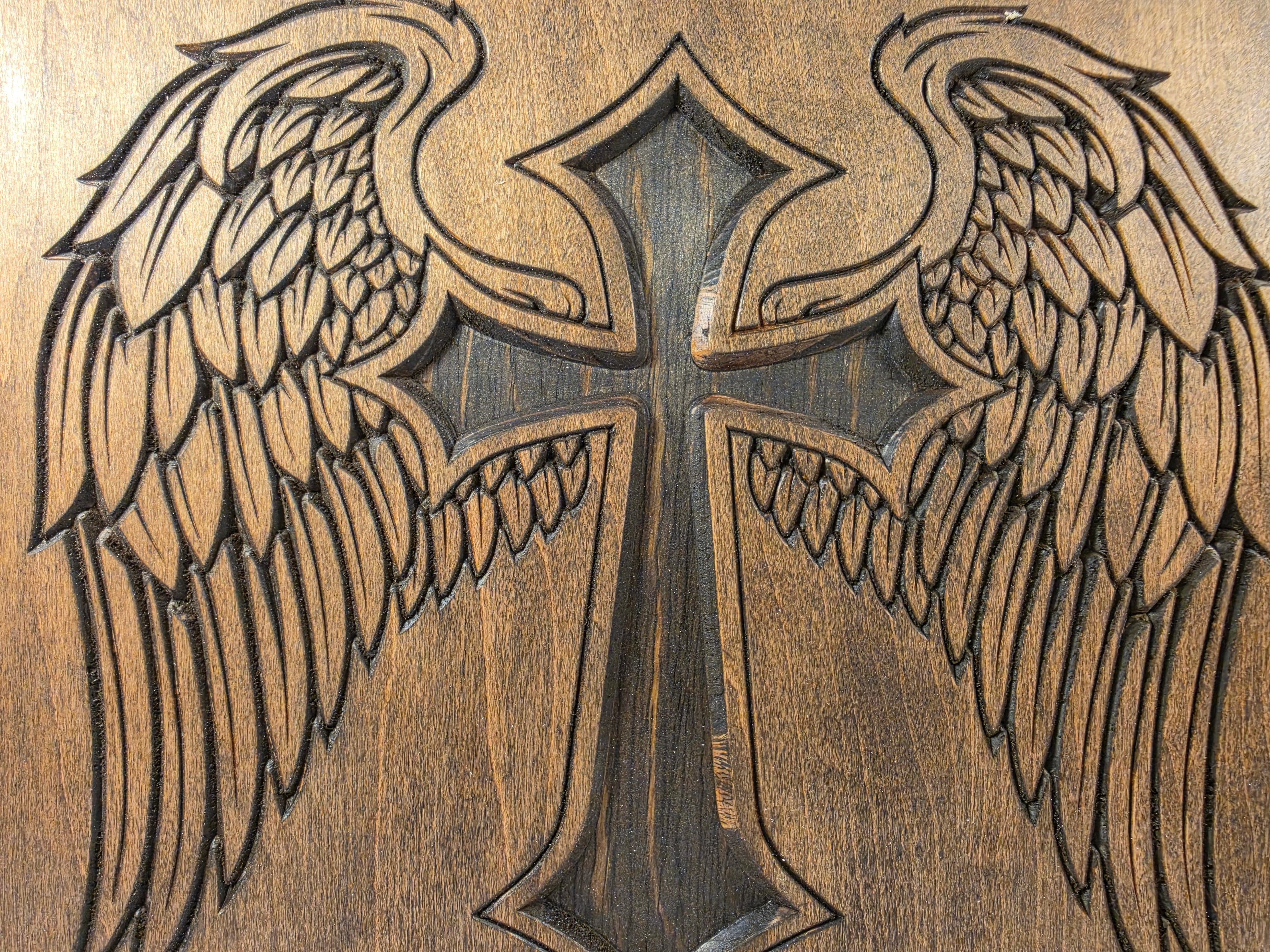 Cross design with wings shown in Dark Walnut